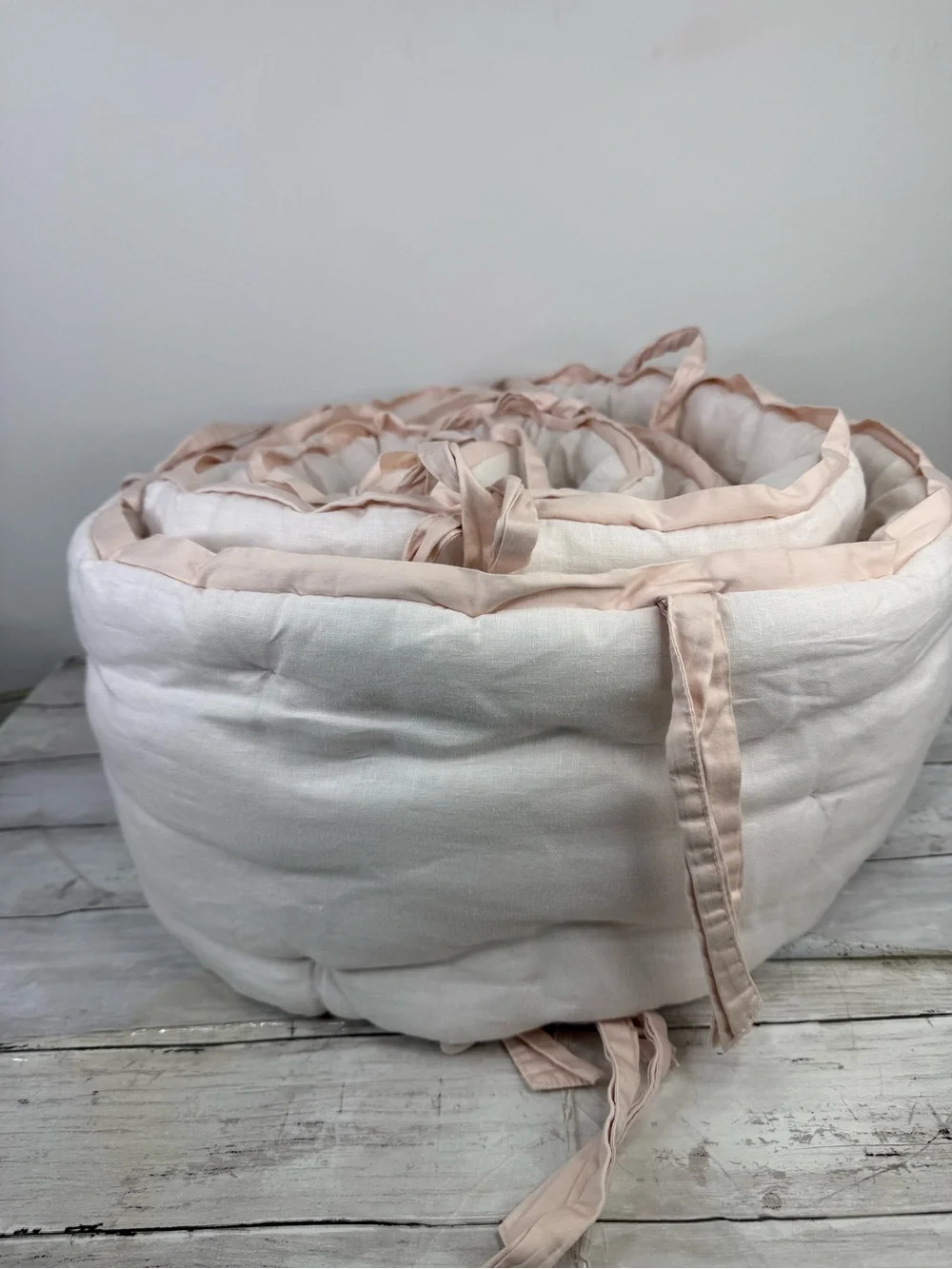 Pottery Barn kids bedding in blush pink.
